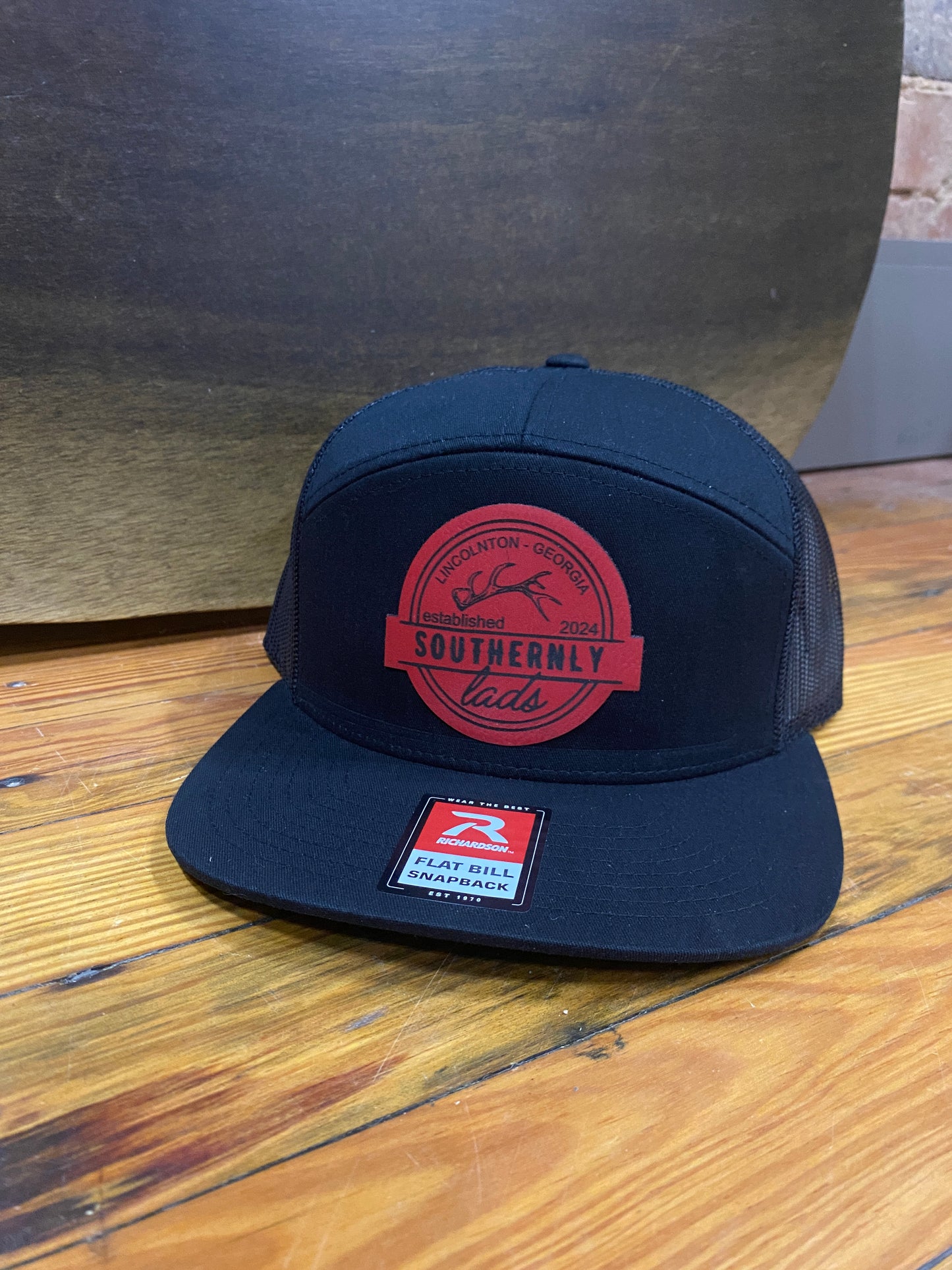 Black 7 Panel Hat with Red Leather Patch